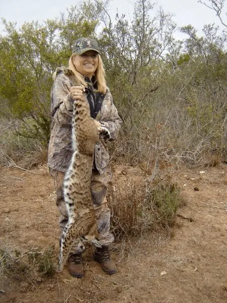 Hunter posing with her harvest in the South Texas brush